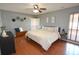 Spacious main bedroom with wood floors and large windows at 2646 Handley Blvd, Lakeland, FL 33803