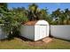 White metal storage shed with rusty roof in backyard at 2646 Handley Blvd, Lakeland, FL 33803