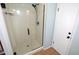 Large walk-in shower with glass enclosure and tiled walls at 2646 Handley Blvd, Lakeland, FL 33803