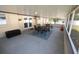 Screened porch with patio furniture and toys at 2646 Handley Blvd, Lakeland, FL 33803