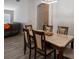 Dining room with table and chairs, hardwood floors, and access to living room at 4722 Harts Brook Ln, Mulberry, FL 33860