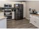 Modern kitchen with stainless steel appliances at 4722 Harts Brook Ln, Mulberry, FL 33860