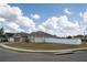 One-story home with a fenced backyard and a paved driveway at 4722 Harts Brook Ln, Mulberry, FL 33860