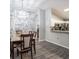 Bright dining room features a table with chairs and an accent wall at 4722 Harts Brook Ln, Mulberry, FL 33860