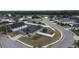 Aerial view of a house in a residential neighborhood at 4722 Harts Brook Ln, Mulberry, FL 33860