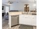 Kitchen with stainless steel appliances and white cabinets at 4722 Harts Brook Ln, Mulberry, FL 33860