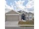 Charming two-story home with a two-car garage at 4722 Harts Brook Ln, Mulberry, FL 33860