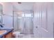 Clean bathroom with a shower and tub at 141 Minniehaha Cir, Haines City, FL 33844
