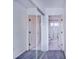 Hallway with mirrored closet and access to bathroom and bedroom at 141 Minniehaha Cir, Haines City, FL 33844