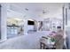 Open-concept living room, kitchen, and dining area at 141 Minniehaha Cir, Haines City, FL 33844