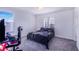 Bedroom with a gaming setup and double bed at 141 Minniehaha Cir, Haines City, FL 33844