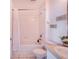 Bathroom with tub shower, toilet, and double vanity at 141 Minniehaha Cir, Haines City, FL 33844