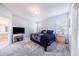 Bright bedroom featuring a king-size bed and ensuite bathroom access at 141 Minniehaha Cir, Haines City, FL 33844