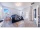 Primary bedroom with king bed and sliding door to patio at 141 Minniehaha Cir, Haines City, FL 33844