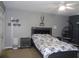 Bedroom with bed, nightstand, and hanging chair at 600 Sunway Ln, Winter Haven, FL 33880