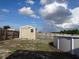 Large backyard with storage shed and above ground pool at 600 Sunway Ln, Winter Haven, FL 33880