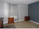 Spacious bedroom with two nightstands and window coverings at 600 Sunway Ln, Winter Haven, FL 33880