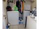 Laundry room with washer, dryer, and ample storage at 600 Sunway Ln, Winter Haven, FL 33880
