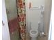 Clean bathroom with shower/tub combo, toilet and vanity at 600 Sunway Ln, Winter Haven, FL 33880