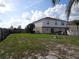 Large backyard with above ground pool and partial view of house at 600 Sunway Ln, Winter Haven, FL 33880