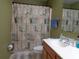 Clean bathroom with shower/tub combo and updated vanity at 600 Sunway Ln, Winter Haven, FL 33880