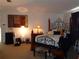 Main bedroom with a large bed and ornate headboard at 600 Sunway Ln, Winter Haven, FL 33880