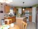 Spacious kitchen featuring an island and ample cabinetry at 600 Sunway Ln, Winter Haven, FL 33880