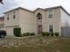 Two-story house with attached garage at 600 Sunway Ln, Winter Haven, FL 33880