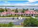 Community clubhouse with lake view and ample parking at 574 Loblolly Pl, Auburndale, FL 33823