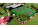 Well maintained tennis courts in a lush green community setting at 574 Loblolly Pl, Auburndale, FL 33823
