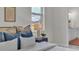 Main bedroom with a king bed, nightstands and a view at 574 Loblolly Pl, Auburndale, FL 33823