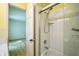 Bathroom with shower/tub combo and white tile at 832 S Hill Ave # 10, Deland, FL 32724