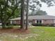 Brick home with large trees in front yard at 832 S Hill Ave # 10, Deland, FL 32724
