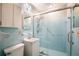 Clean bathroom with light blue tile, shower, and vanity at 832 S Hill Ave # 10, Deland, FL 32724