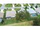 Aerial view of houses with pools and lush lawns at 2636 Huntington Hills Dr, Lakeland, FL 33810