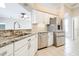 Modern kitchen with granite countertops and stainless steel appliances at 2636 Huntington Hills Dr, Lakeland, FL 33810