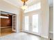 Bright and spacious entryway with tile floors and double glass doors at 2636 Huntington Hills Dr, Lakeland, FL 33810