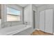 Relaxing bathroom featuring a soaking tub and marble accents at 5335 Clay Dr, Lakeland, FL 33813