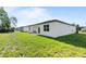Single story home with backyard and patio at 266 Hyacinth Ct, Kissimmee, FL 34759