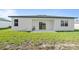 Single story home with backyard and patio at 266 Hyacinth Ct, Kissimmee, FL 34759