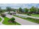 Community entrance with brick columns and fountain at 7330 Reflections Lake Dr, Lakeland, FL 33813