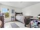 Cozy bedroom featuring a comfortable bed and ample natural light at 4255 Summer Landing Dr # 106, Lakeland, FL 33810