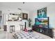 Living room with large TV and comfy seating at 4255 Summer Landing Dr # 106, Lakeland, FL 33810