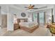 Large main bedroom with a king-size bed and ceiling fan at 4184 Prima Lago Cir, Lakeland, FL 33810