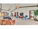 Open living area with comfortable seating and access to other rooms at 7884 N Lake Buffum Shores Rd, Fort Meade, FL 33841