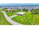 Waterfront property with lush lawn and dock access at 7884 N Lake Buffum Shores Rd, Fort Meade, FL 33841
