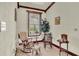 Cozy sitting area featuring rocking chairs and a tranquil atmosphere at 7884 N Lake Buffum Shores Rd, Fort Meade, FL 33841
