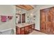 Double vanity bathroom with large mirror at 7884 N Lake Buffum Shores Rd, Fort Meade, FL 33841