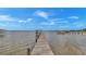 Long wooden dock extending into the water at 7884 N Lake Buffum Shores Rd, Fort Meade, FL 33841