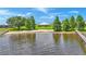 Aerial view of waterfront home with private dock and expansive lake access at 7884 N Lake Buffum Shores Rd, Fort Meade, FL 33841